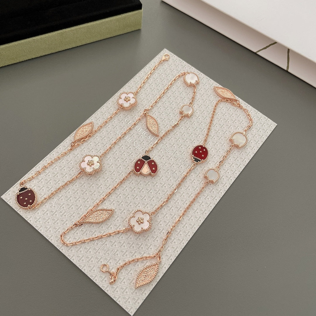 „Glow Jewelry“ LUCKY SPRING 15 MOTIVE ROSÉGOLD-HALSKETTE