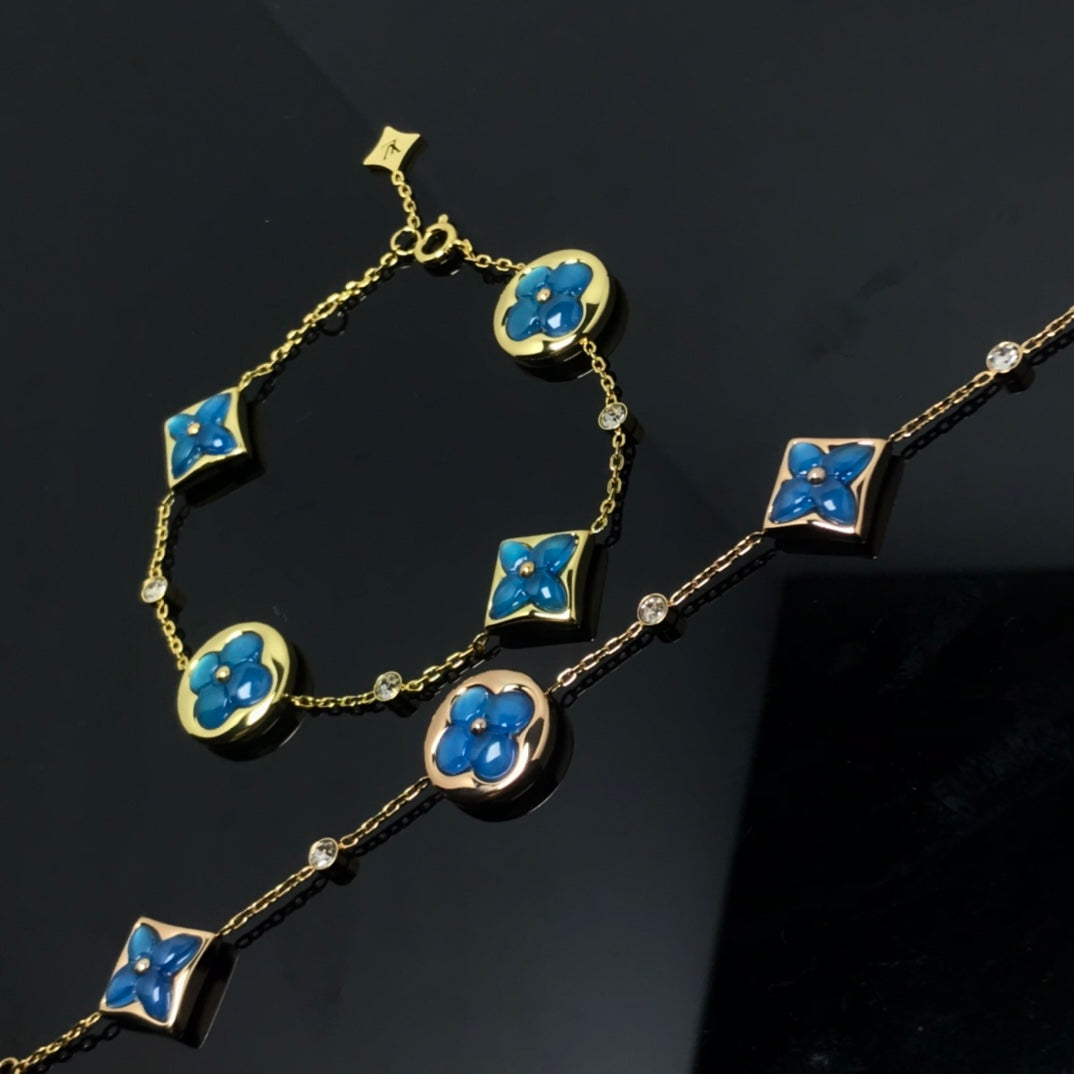 ¡®Glow Jewelry¡¯STAR AND SUN 4 MOTIF BLUE BRACELET