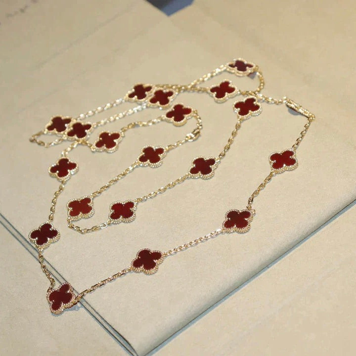 „Glow Jewelry“ Kleeblatt-Halskette mit 20 Motiven und Karneol