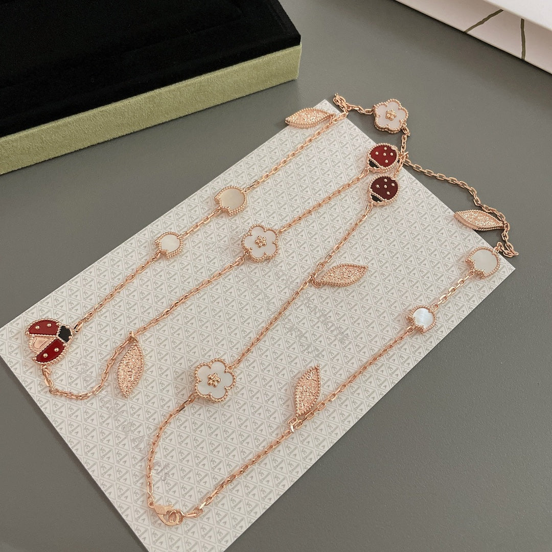„Glow Jewelry“ LUCKY SPRING 15 MOTIVE ROSÉGOLD-HALSKETTE