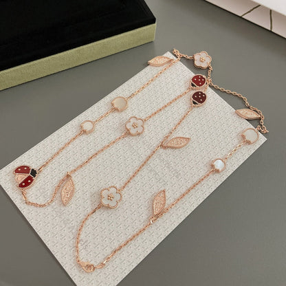 „Glow Jewelry“ LUCKY SPRING 15 MOTIVE ROSÉGOLD-HALSKETTE