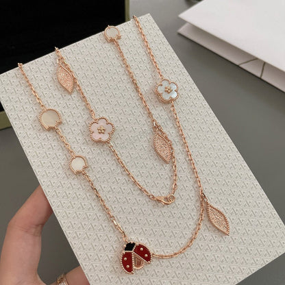 „Glow Jewelry“ LUCKY SPRING 15 MOTIVE ROSÉGOLD-HALSKETTE