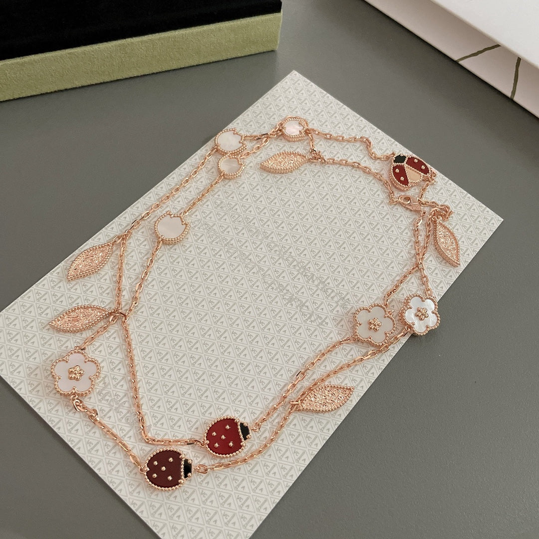 „Glow Jewelry“ LUCKY SPRING 15 MOTIVE ROSÉGOLD-HALSKETTE
