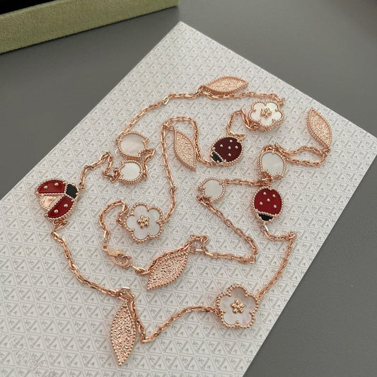 „Glow Jewelry“ LUCKY SPRING 15 MOTIVE ROSÉGOLD-HALSKETTE