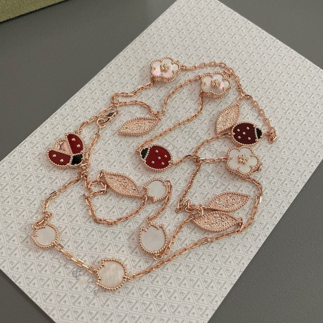 „Glow Jewelry“ LUCKY SPRING 15 MOTIVE ROSÉGOLD-HALSKETTE