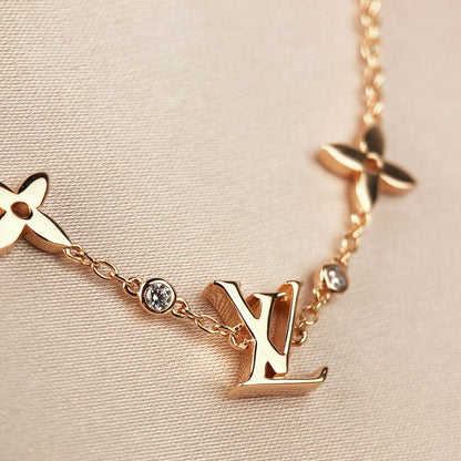 „Glow Jewelry“ STERNE UND SONNE 7 MOTIVE GOLDBRACELET
