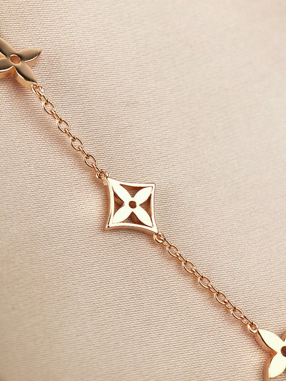 „Glow Jewelry“ STERNE UND SONNE 7 MOTIVE GOLDBRACELET