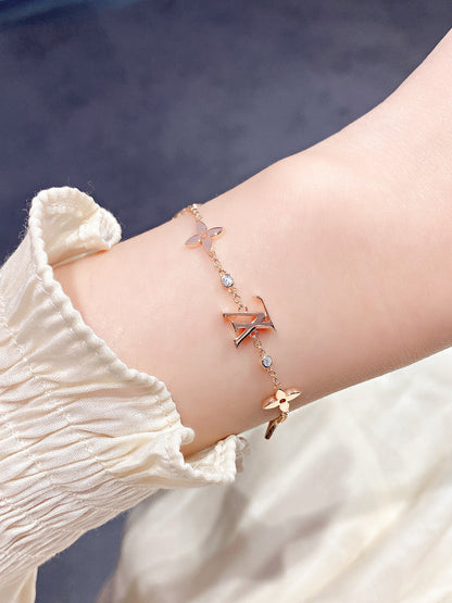 „Glow Jewelry“ STERNE UND SONNE 7 MOTIVE GOLDBRACELET