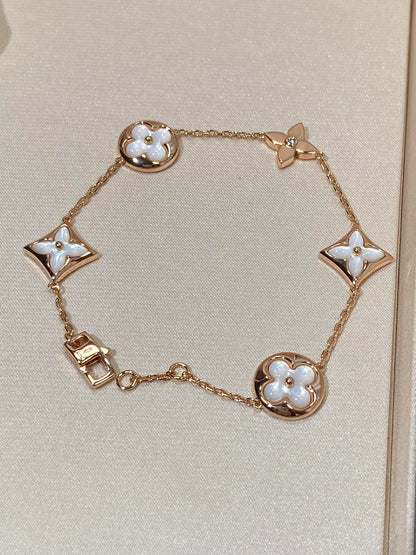 [Glow Jewelry]STAR AND SUN 5 MOTIF MOP PINK GOLD BRACELET
