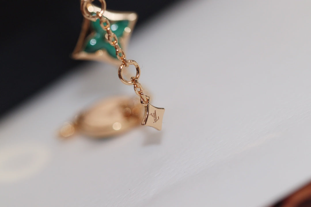„Glow Jewelry“ Stern- und Sonnen-Armband mit 4 Motiven aus Rotgold und Malachit