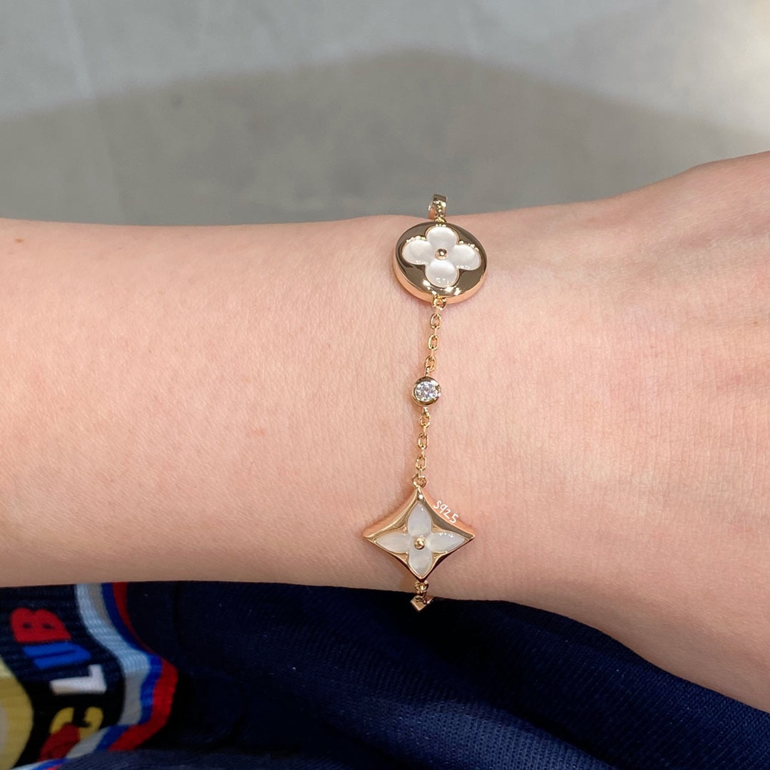 ¡®Glow Jewelry¡¯STAR AND SUN 4 MOTIF WHITE MOP PINK GOLD BRACELET