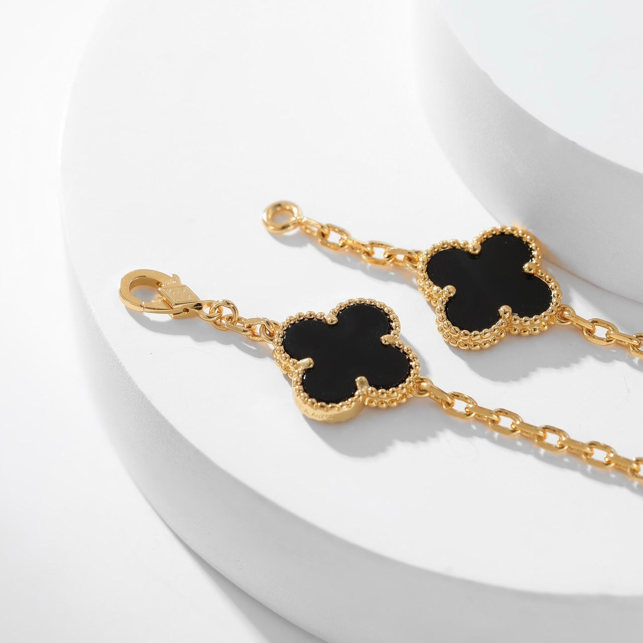 „Glow Jewelry“ KLEE-KETTE MIT 10 MOTIVEN AUS ONYX